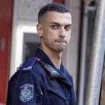 Senior Constable Beau Lamarre-Condon looking sideways the officer is accused of killing two young men
